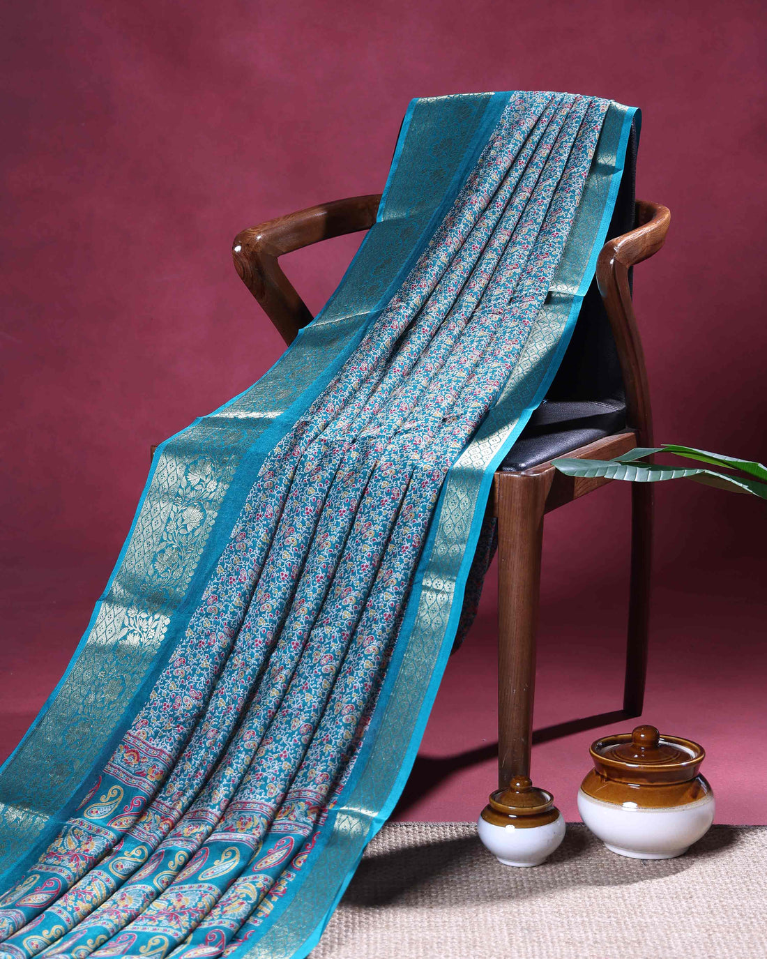 Elegant Dola Silk Saree with All Over Floral Buti Design and Intricately Woven Traditional Border - Turquoise Blue