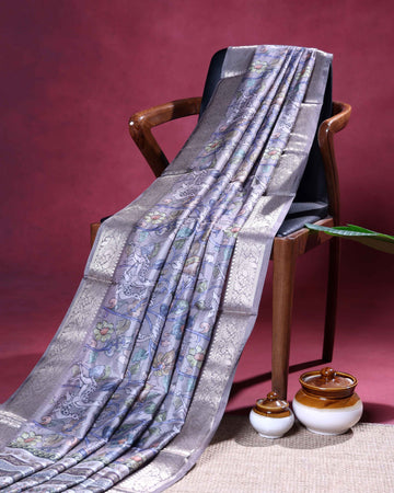 Elegant Dola Silk Saree with All Over Floral Vine Print and Traditional Deer Motif Woven Border - Grey