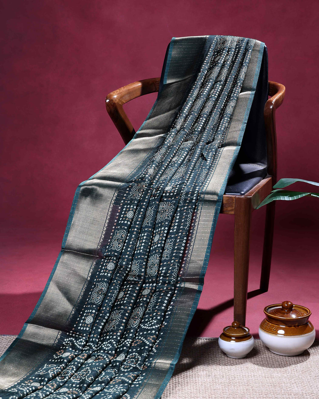 Elegant Dola Silk Saree with All Over Traditional Butta Motifs and Subtle Zari Woven Border - Dark Green