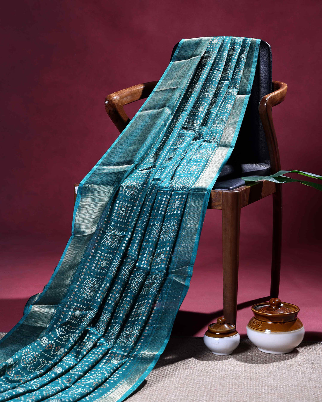 Elegant Dola Silk Saree with All Over Traditional Butta Motifs and Subtle Zari Woven Border - Teal
