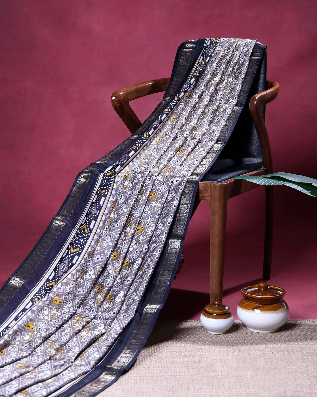 Elegant Dola Silk Saree with All Over Traditional Ikkat Inspired Geometric Motifs and  Zari Woven Border - Grey