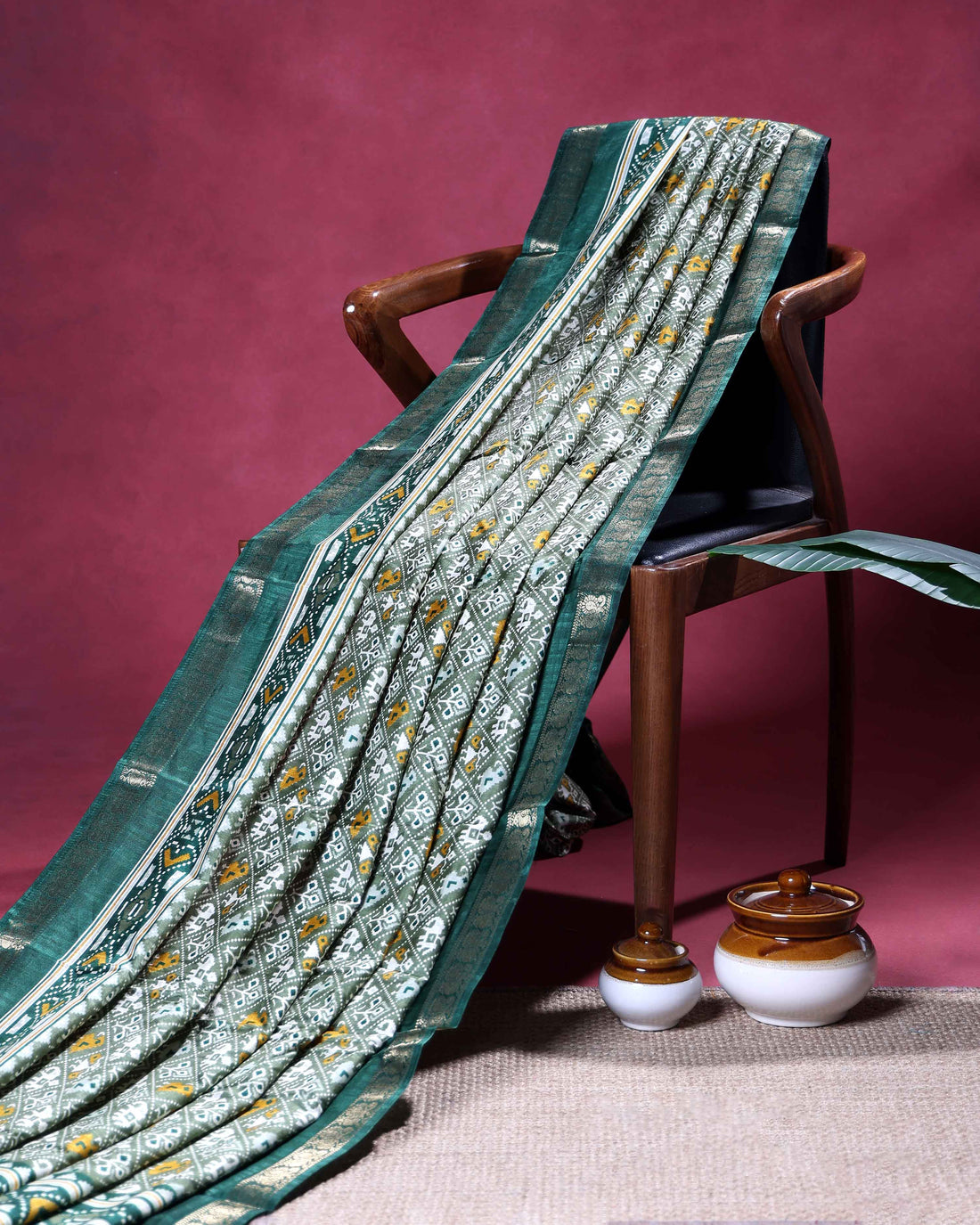 Elegant Dola Silk Saree with All Over Traditional Ikkat Inspired Geometric Motifs and  Zari Woven Border - Light Green