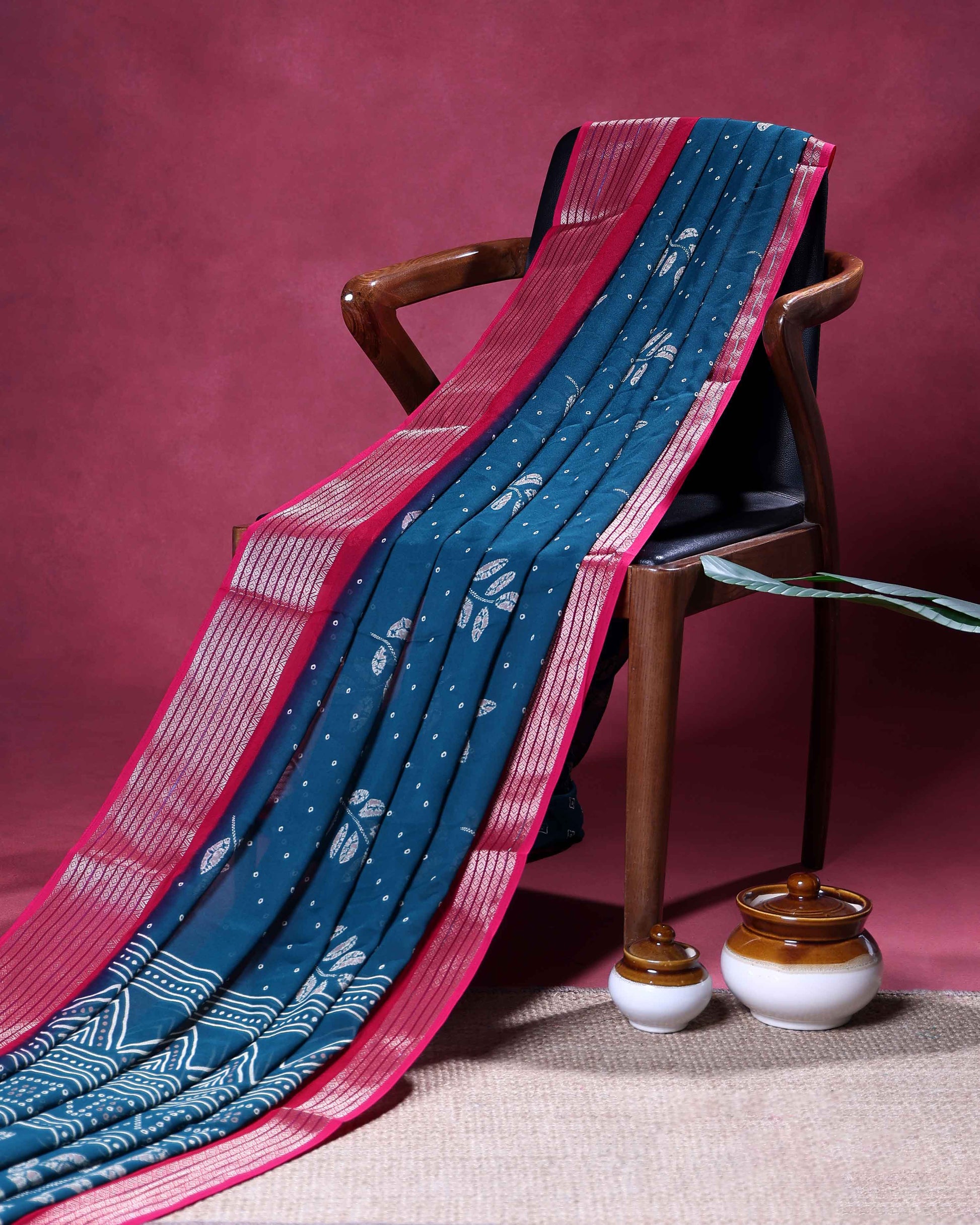 Elegant Dola Silk Saree with All Over Woven Leaf Buti Design and Intricate Geometric Border - Teal