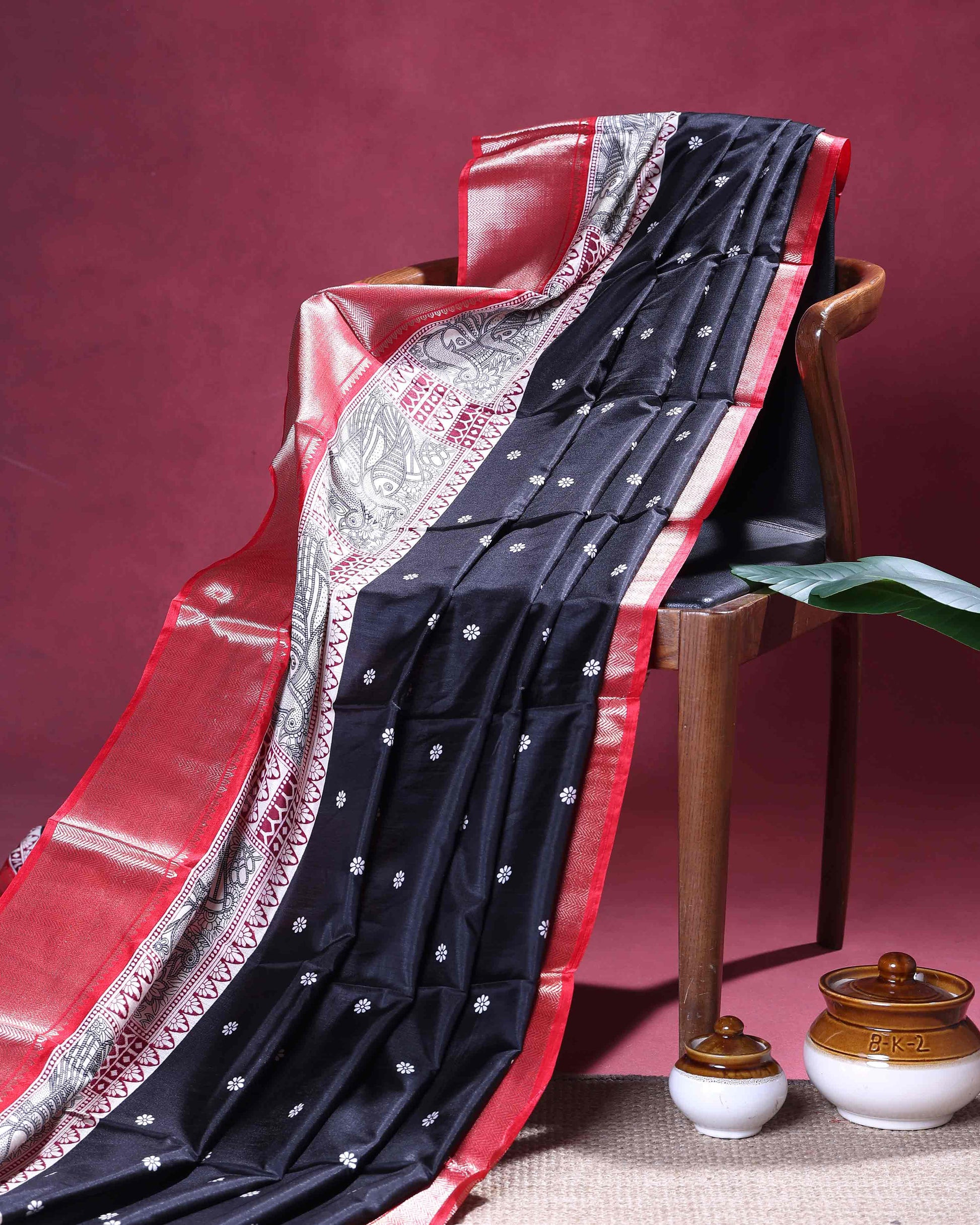 Elegant Dola Silk Saree with Contrast Woven Border Traditional Paisley Pallu and Delicate Butta Motifs - Black