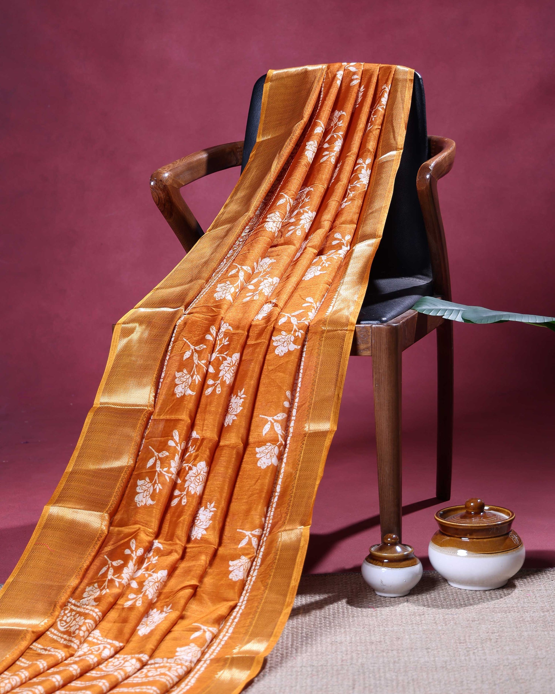 Elegant Dola Silk Saree with Graceful Floral Vine Pattern and Decorative Ethnic Woven Border - Orange
