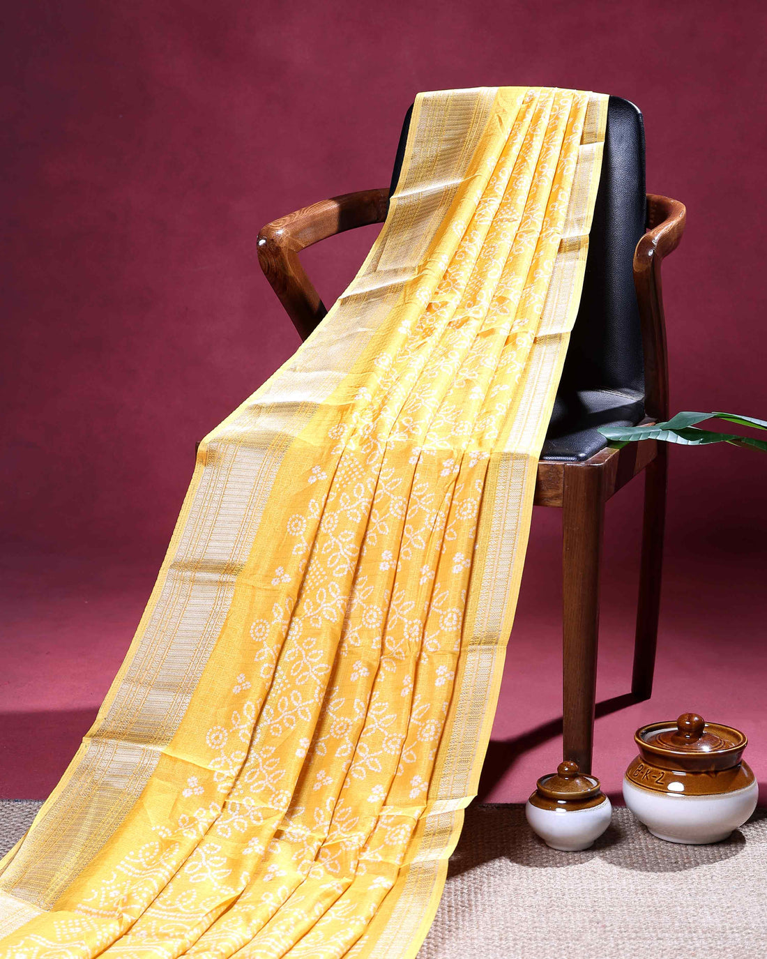 Elegant Dola Silk Saree with Intricate Floral Vine Weave and Zari Border - Yellow