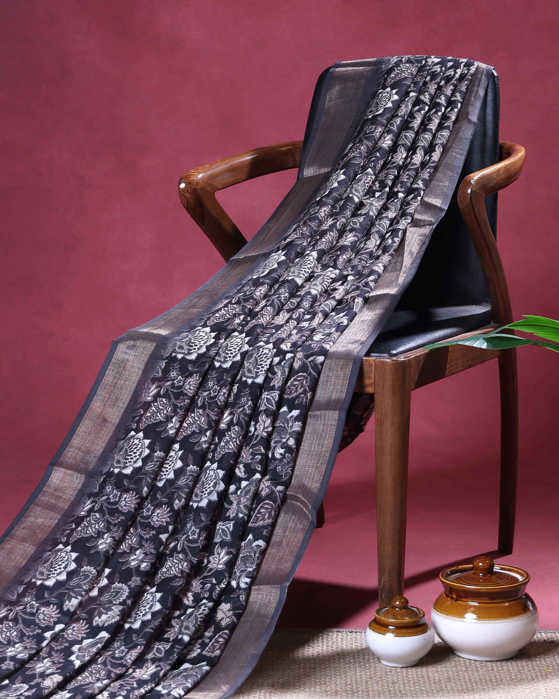 Elegant Dola Silk Saree with Intricate Floral Woven Motifs and Elegant Zari Border - Black