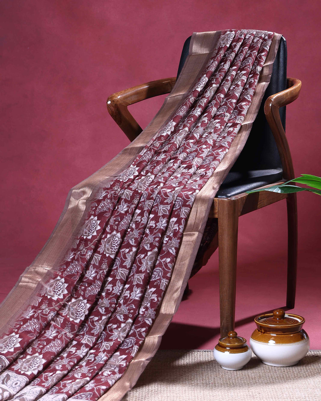 Elegant Dola Silk Saree with Intricate Floral Woven Motifs and Elegant Zari Border - Maroon