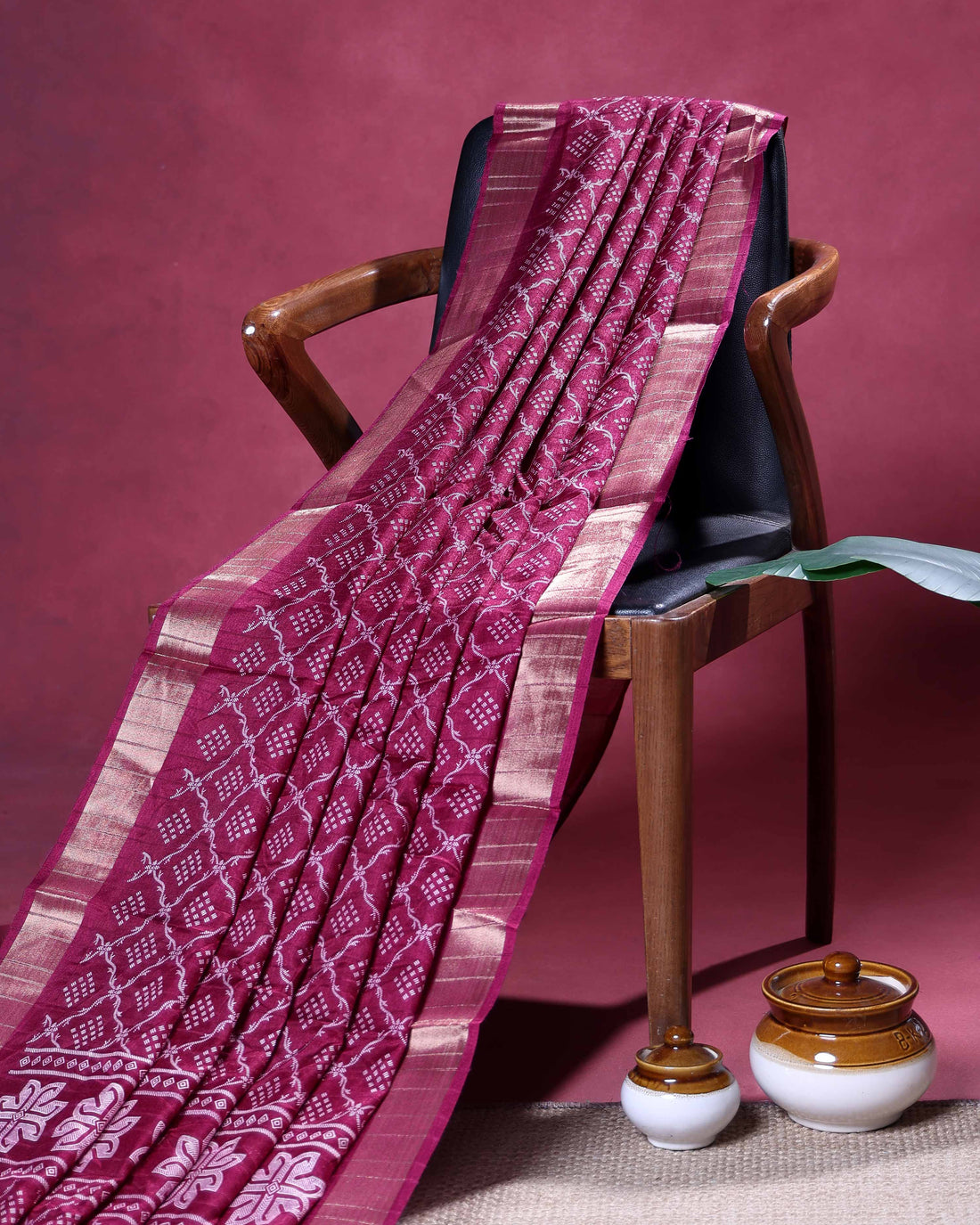 Elegant Dola Silk Saree with Intricate Geometric and Floral Pattern Enhanced by a Contrast Border - Burgundy