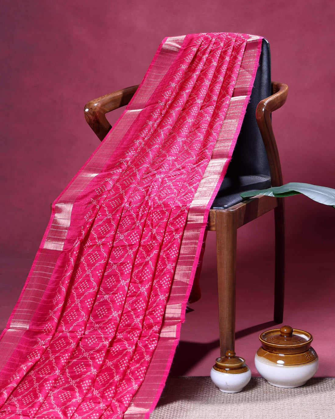 Elegant Dola Silk Saree with Intricate Geometric and Floral Pattern Enhanced by a Contrast Border - Pink