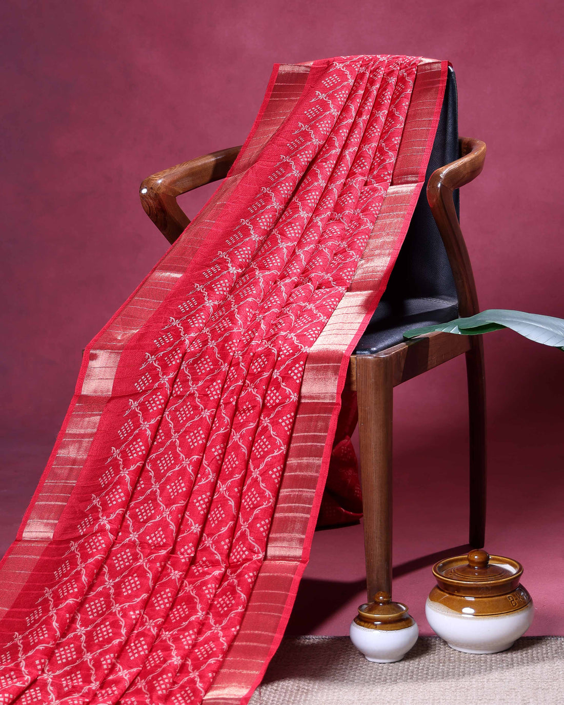 Elegant Dola Silk Saree with Intricate Geometric and Floral Pattern Enhanced by a Contrast Border - Red