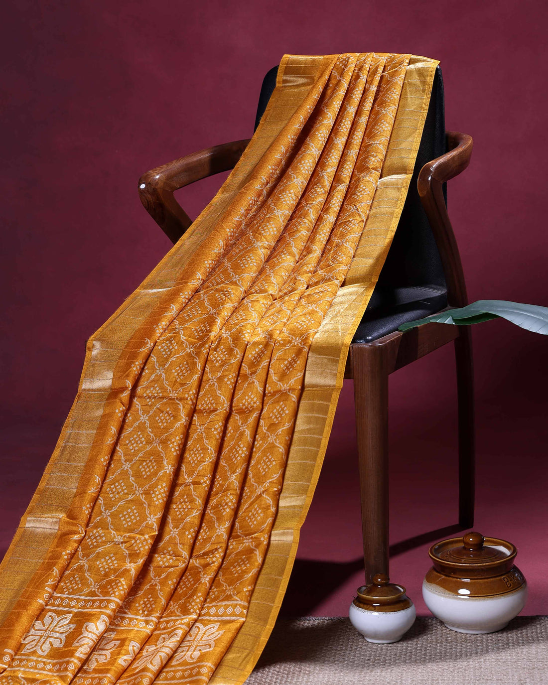 Elegant Dola Silk Saree with Intricate Geometric and Floral Pattern Enhanced by a Contrast Border - Yellow