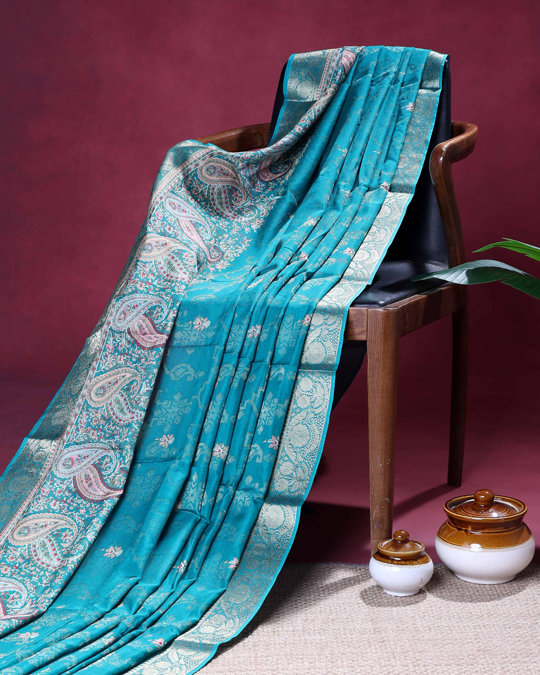 Elegant Dola Silk Saree with Intricate Paisley Woven Pallu with Delicate Floral Motifs and Rich Zari Border - Blue