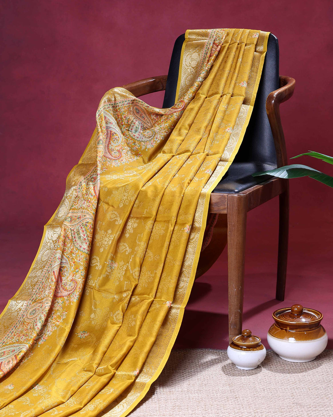 Elegant Dola Silk Saree with Intricate Paisley Woven Pallu with Delicate Floral Motifs and Rich Zari Border - Yellow