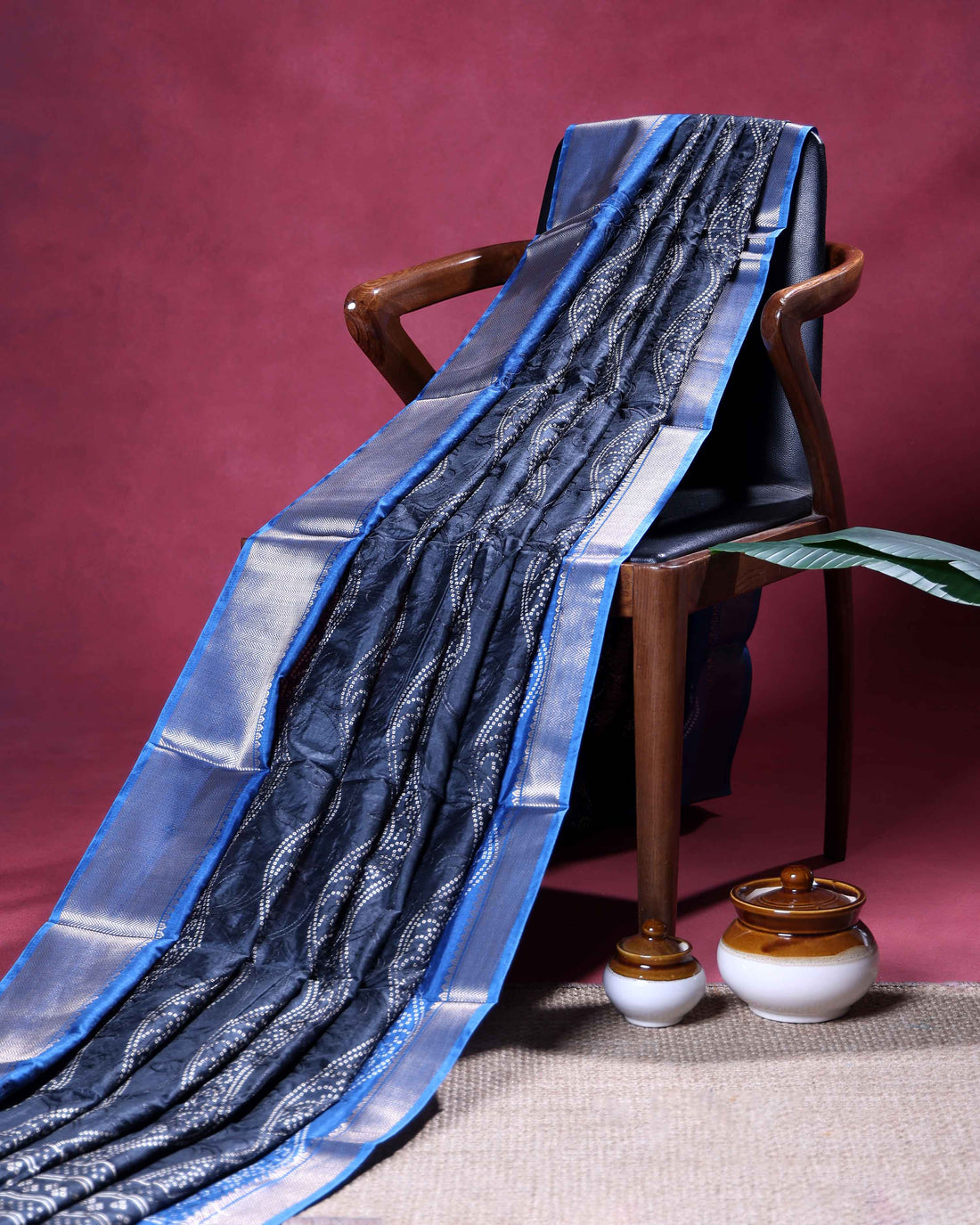 Elegant Dola Silk Saree with Intricate Wave Inspired Buti Motifs and Traditional Zari Woven Border Design - Navy Blue