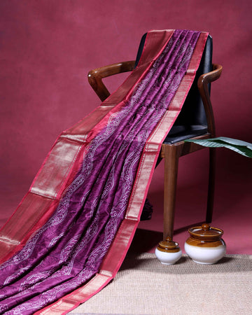 Elegant Dola Silk Saree with Intricate Wave Inspired Buti Motifs and Traditional Zari Woven Border Design - Purple
