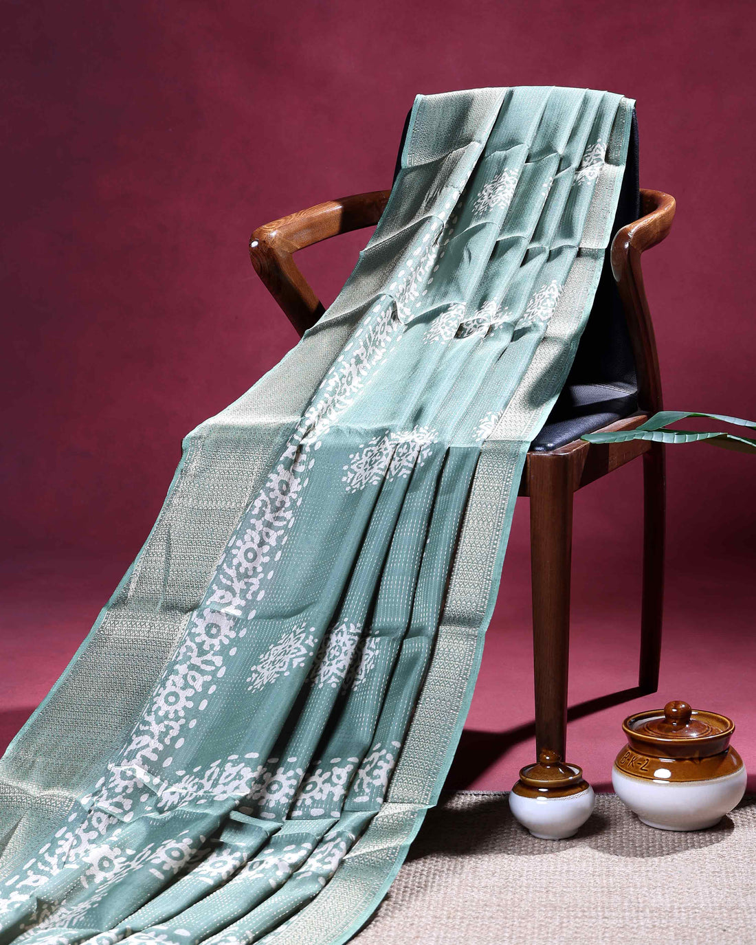 Elegant Dola Silk Saree with Intricate Woven Motifs Traditional Zari Border and Textured Pallu - Green