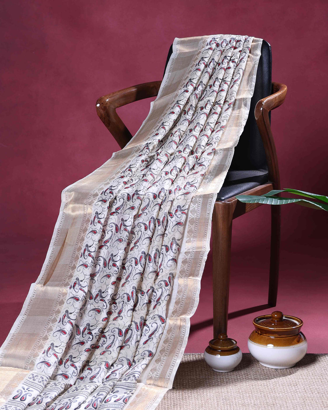 Elegant Dola Silk Saree with Subtle All Over Paisley Print and a Graceful Zari Border  - Off White