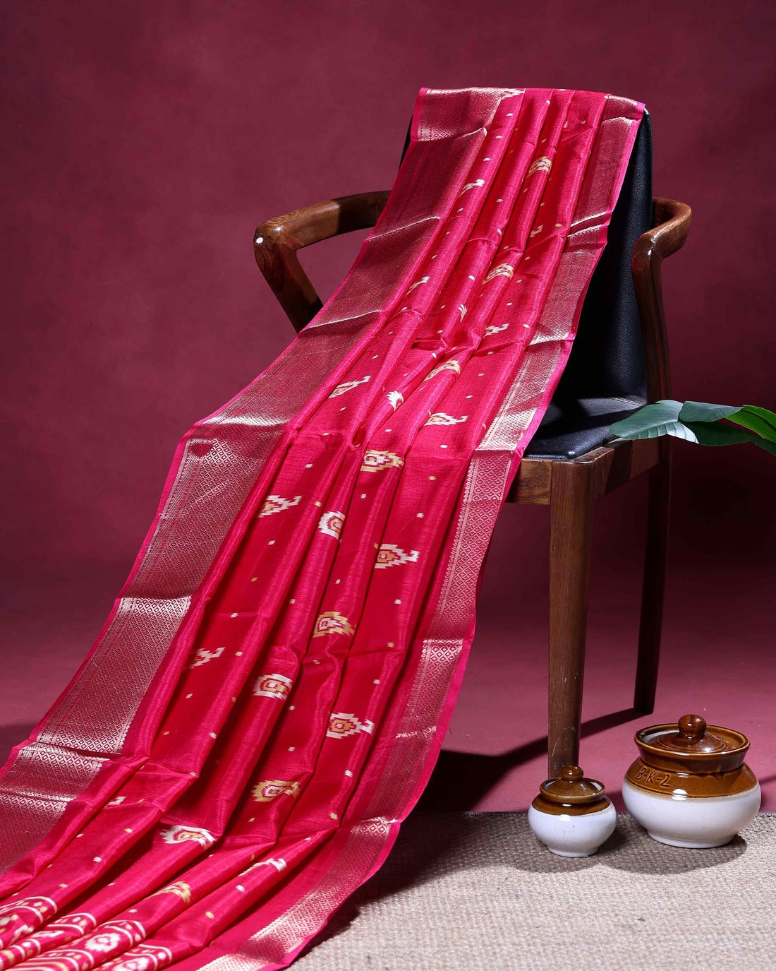 Elegant Dola Silk Saree with Subtle Traditional Butta Motifs and Rich Zari Woven Border - Rani Pink