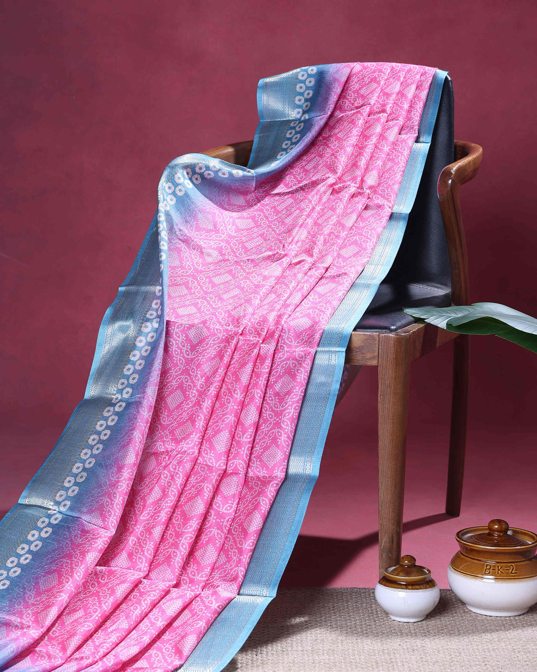 Elegant Dola Silk Saree with Traditional Bandhani Inspired Body and a Rich Zari Border - Pink