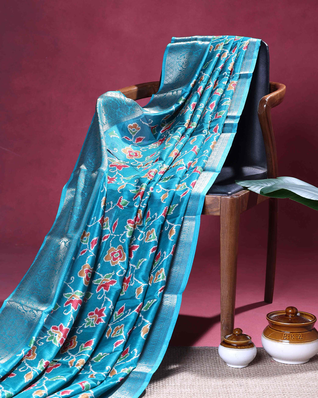 Elegant Dola Silk Saree with Traditional Floral Inspired Body and a Rich Zari Border - Blue