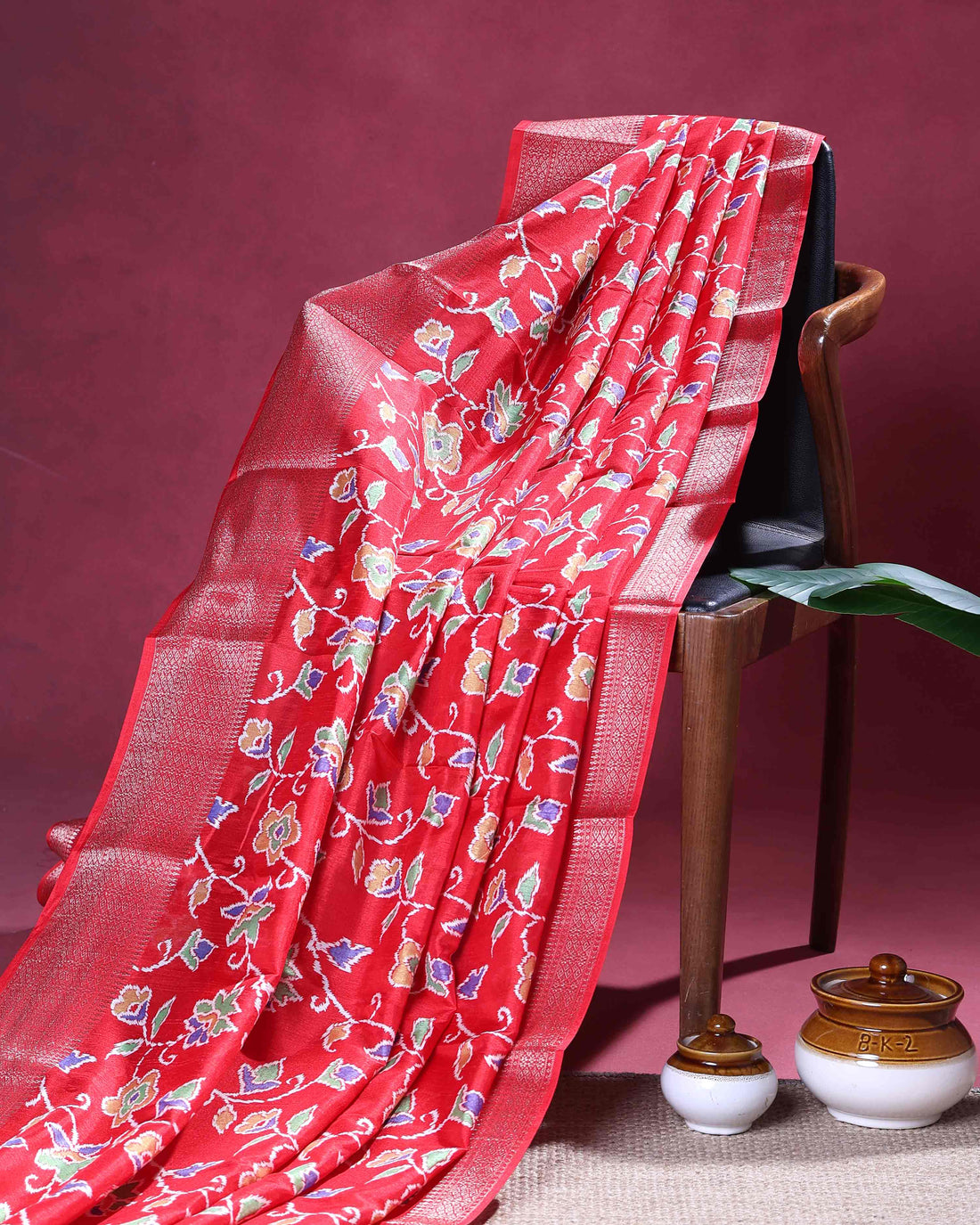 Elegant Dola Silk Saree with Traditional Floral Inspired Body and a Rich Zari Border - Red
