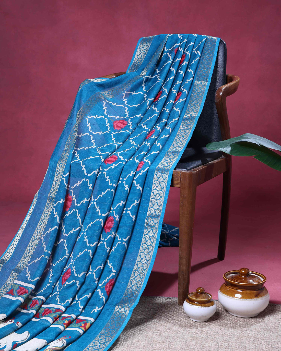 Elegant Dola Silk Saree with Traditional Floral Lattice Patterns And Silver Zari Border - Blue