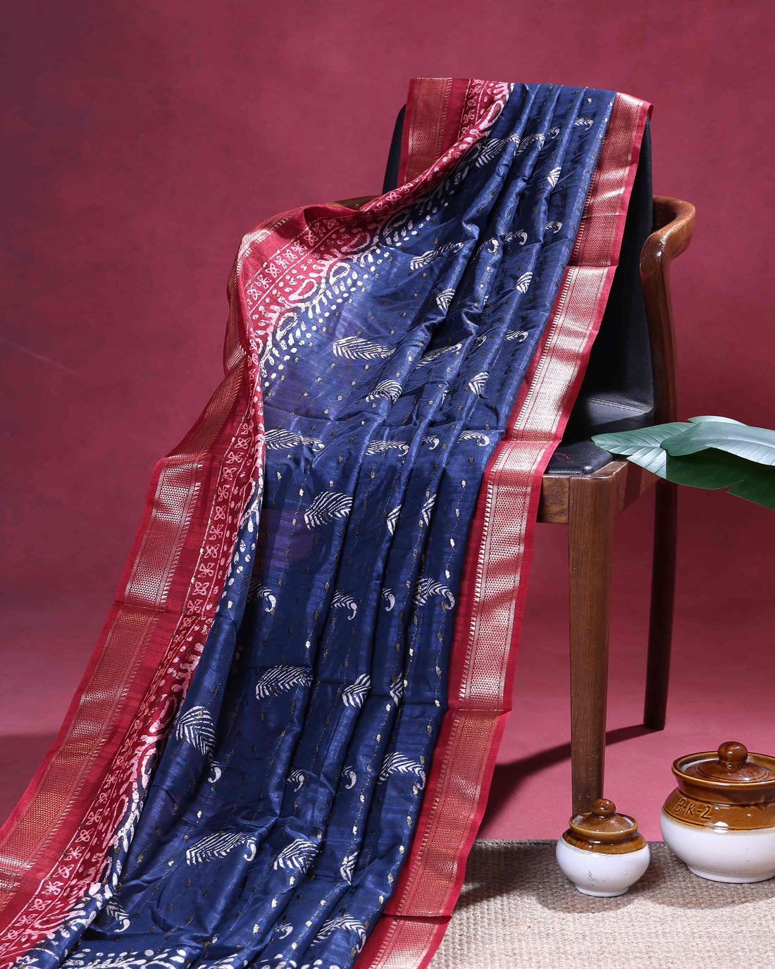 Elegant Dola Silk Saree with Traditional Paisley & Leaf Motifs and Rich Contrast Woven Border - Navy Blue