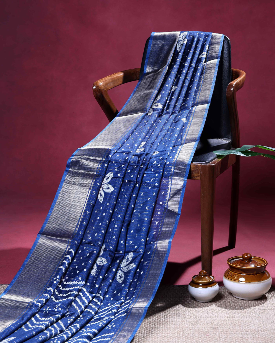 Elegant Dola Silk Saree with Woven Floral Butta Motifs Dotted Weave and Traditional Zari Border - Blue