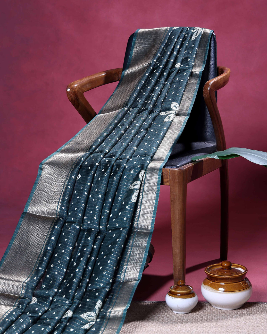Elegant Dola Silk Saree with Woven Floral Butta Motifs Dotted Weave and Traditional Zari Border - Dark Green