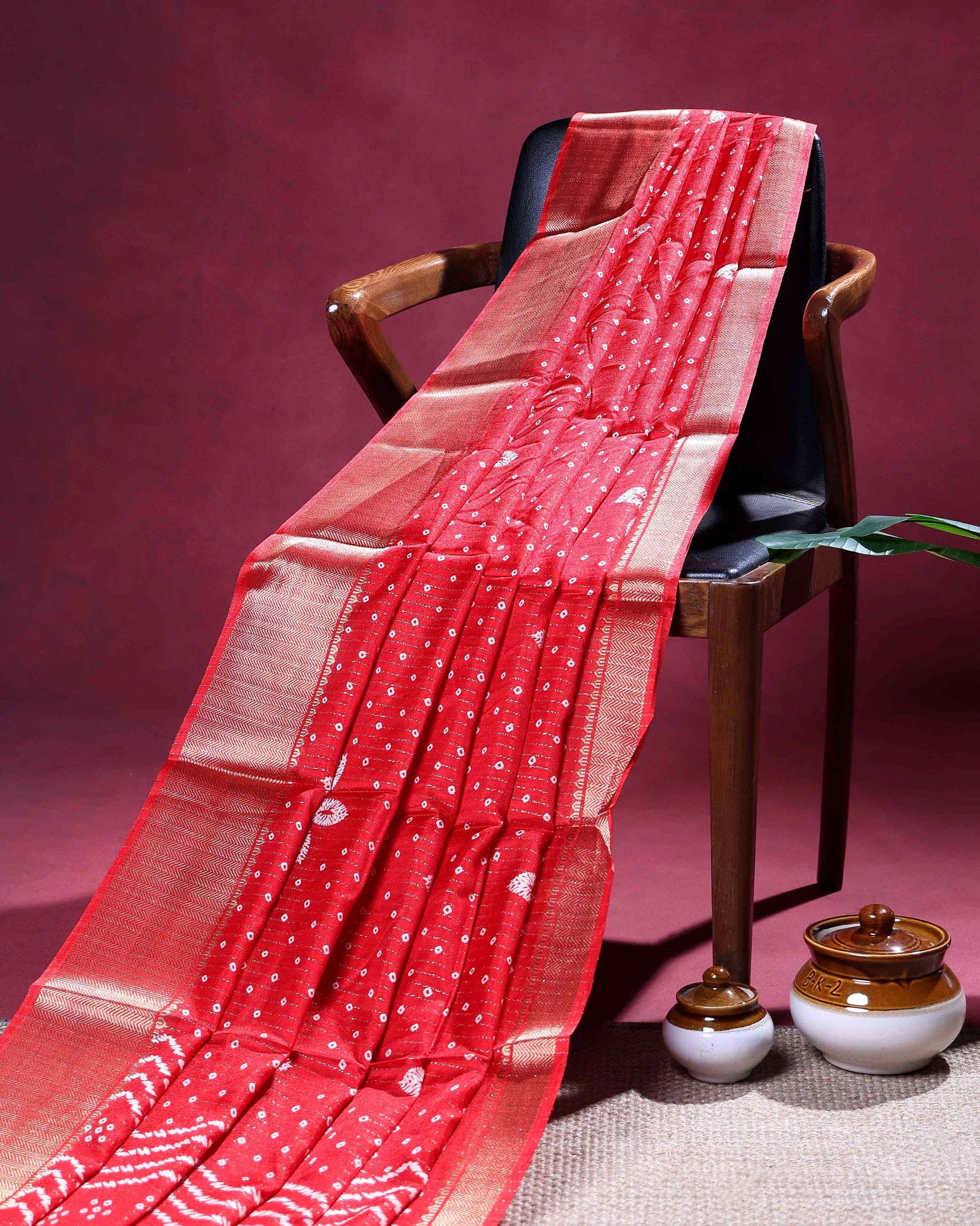 Elegant Dola Silk Saree with Woven Floral Butta Motifs Dotted Weave and Traditional Zari Border - Red