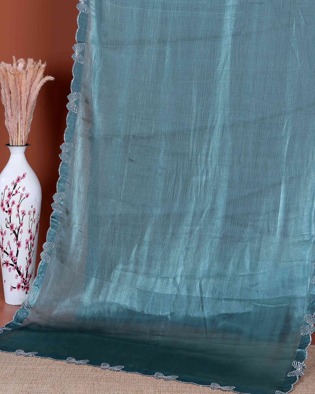 Elegant Fancy Saree with Subtle Sheen Finish & Delicate Butterfly Patterned Lace Border - Teal