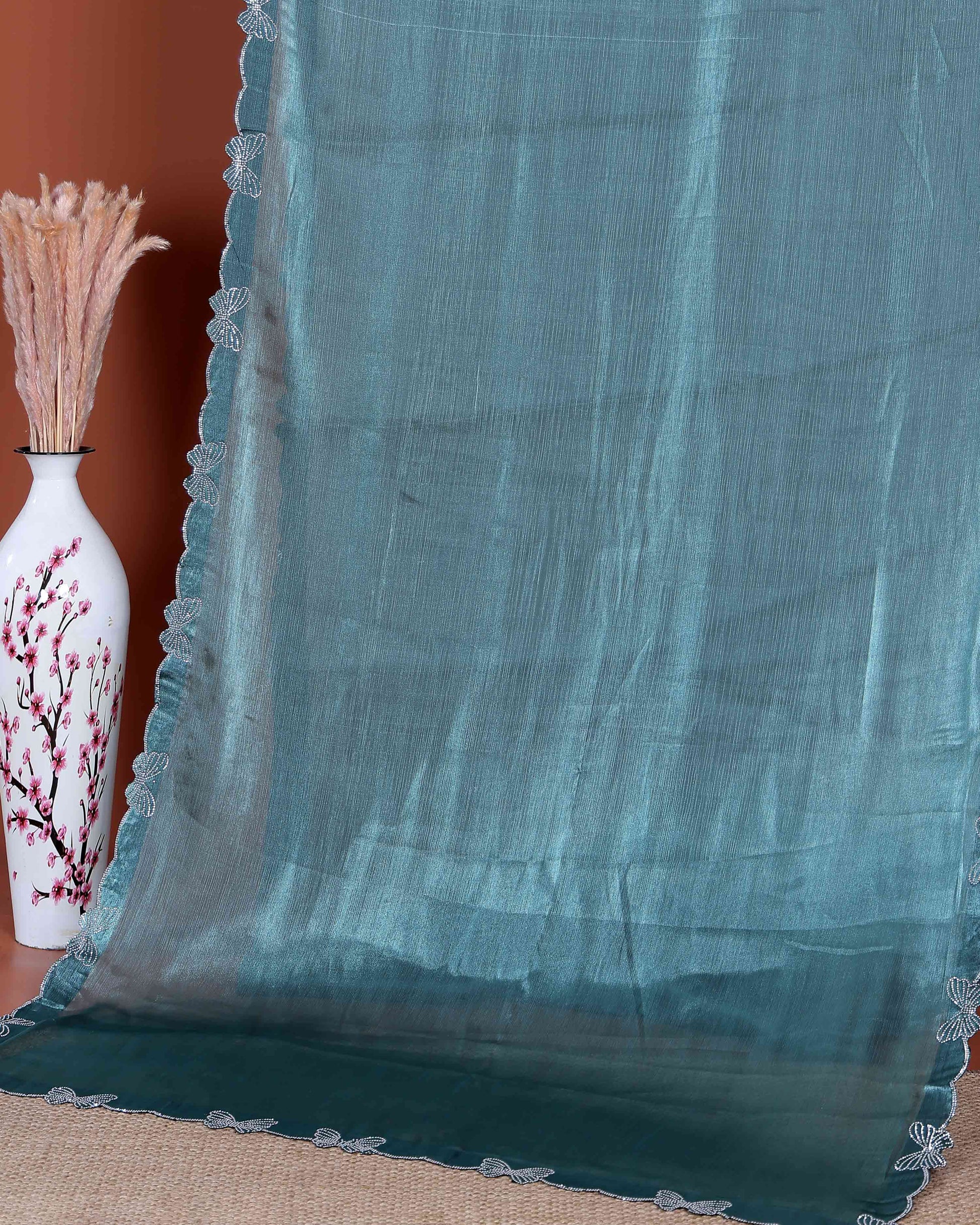 Elegant Fancy Saree with Subtle Sheen Finish & Delicate Butterfly Patterned Lace Border - Teal