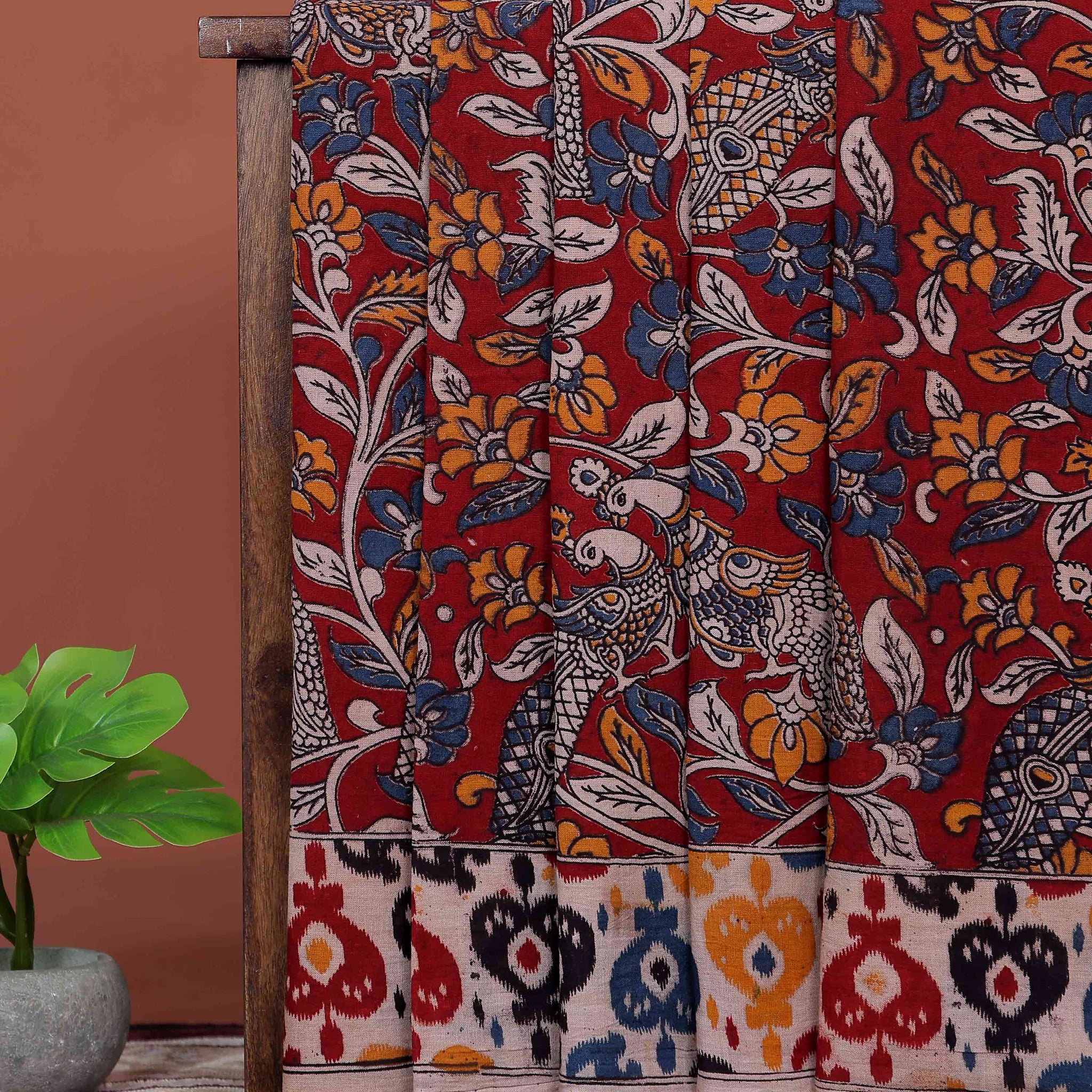 Elegant Handloom Kalamkari Cotton Saree with Traditional Floral Artwork and Ikkat Inspired Contrast Border - Red