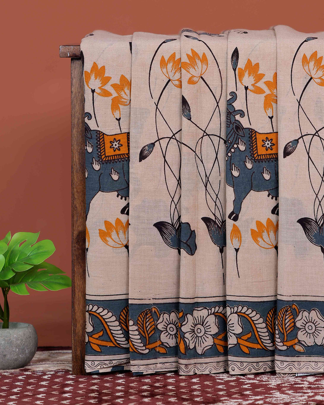 Elegant Handloom Kalamkari Cotton Saree with Traditional Lotus Artwork and Folk Animal Motif Border - Sandal
