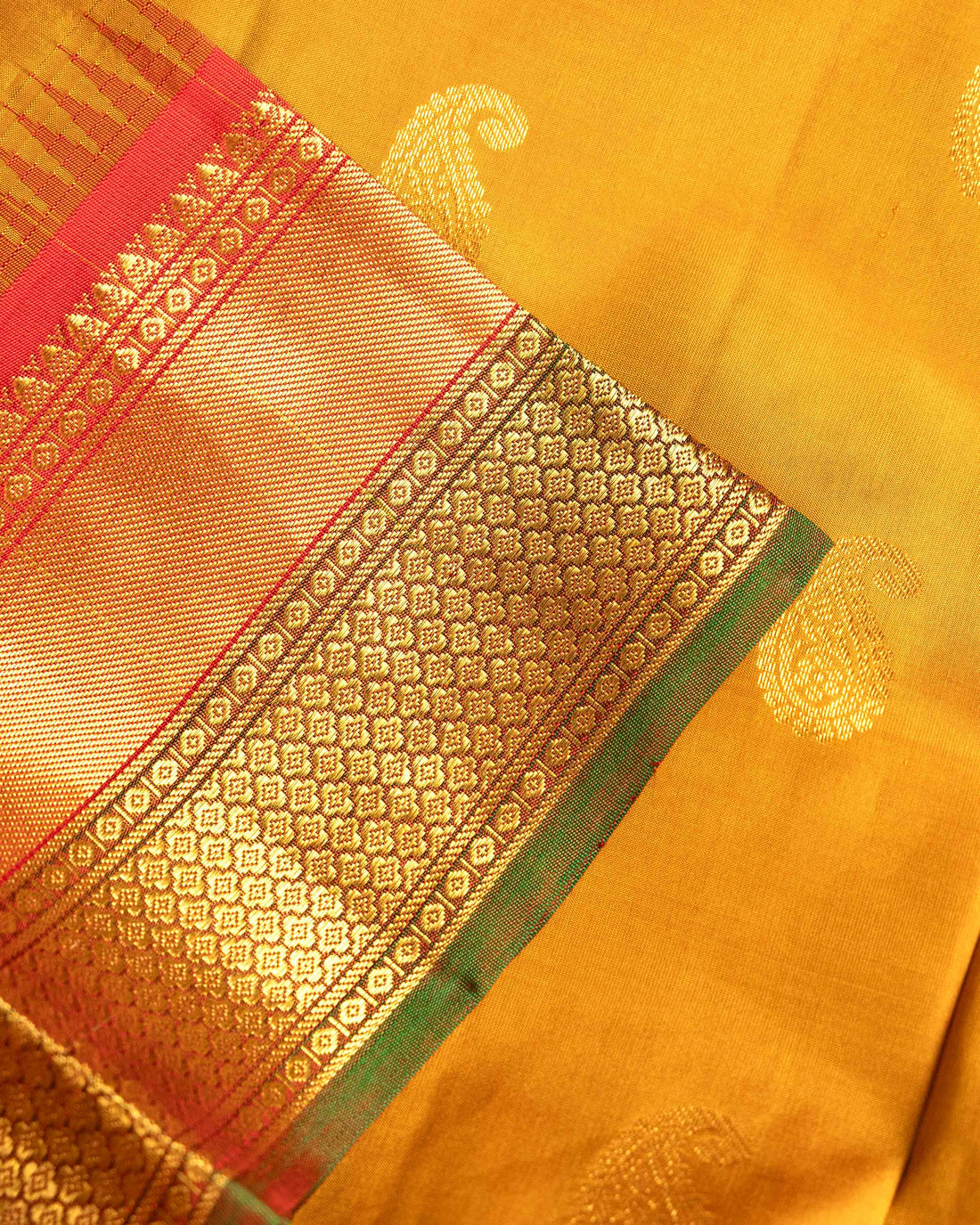 Elegant Kanchipuram Pure Silk Saree with Paisley Butta Weave and Traditional Contrast Zari Woven Border - Yellow