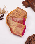 Elegant Kanchipuram Tissue Silk Saree with Floral Brocade Weaving and Rich Traditional Zari Border - Gold