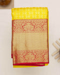 Elegant Kanchipuram Tissue Silk Saree with Intricate Zari Weaving and Traditional Designer Border - Yellow