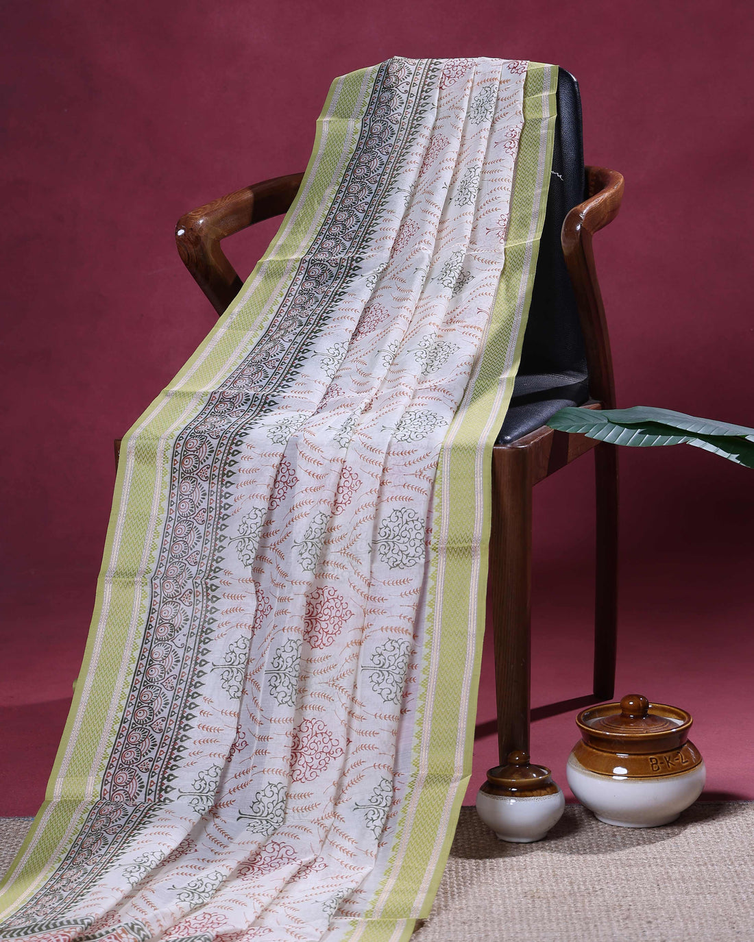 Elegant Linen Cotton Saree with All-Over Tree Inspired Motifs and Intricate Ethnic Border Weave - Cream