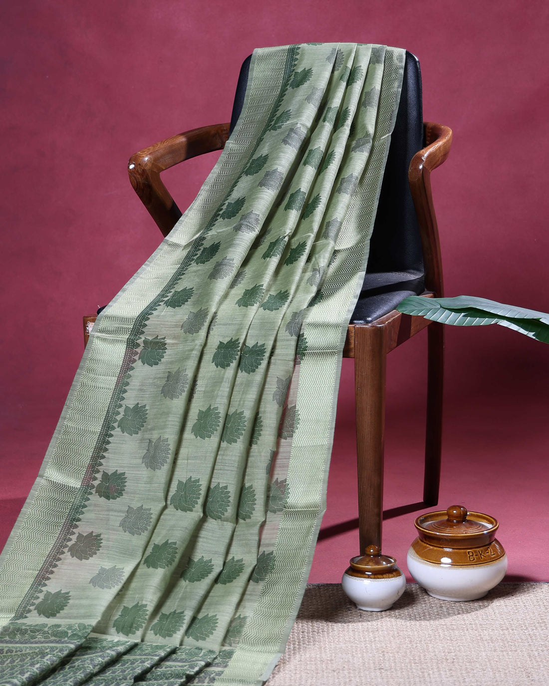 Elegant Linen Cotton Saree with Woven Floral Butta Motifs and Intricate Jacquard Border Design - Green