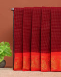 Elegant Madurai Sungudi Cotton Saree with Zari Checked Body and Rich Motif Border - Dark Maroon