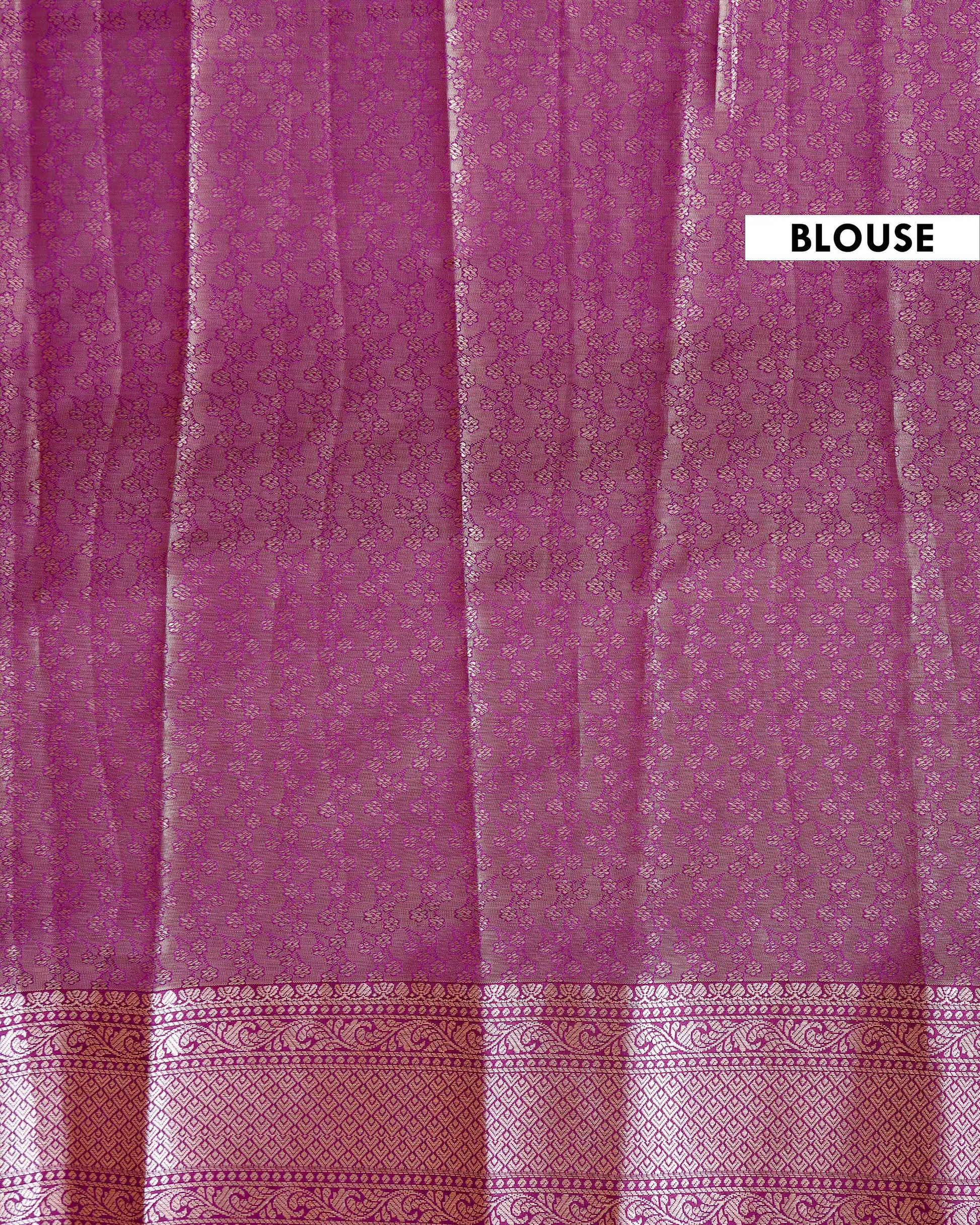 Elegant Niranjana Silk Saree Adorned with Detailed Zari Floral Patterns and Ornate Border - Green