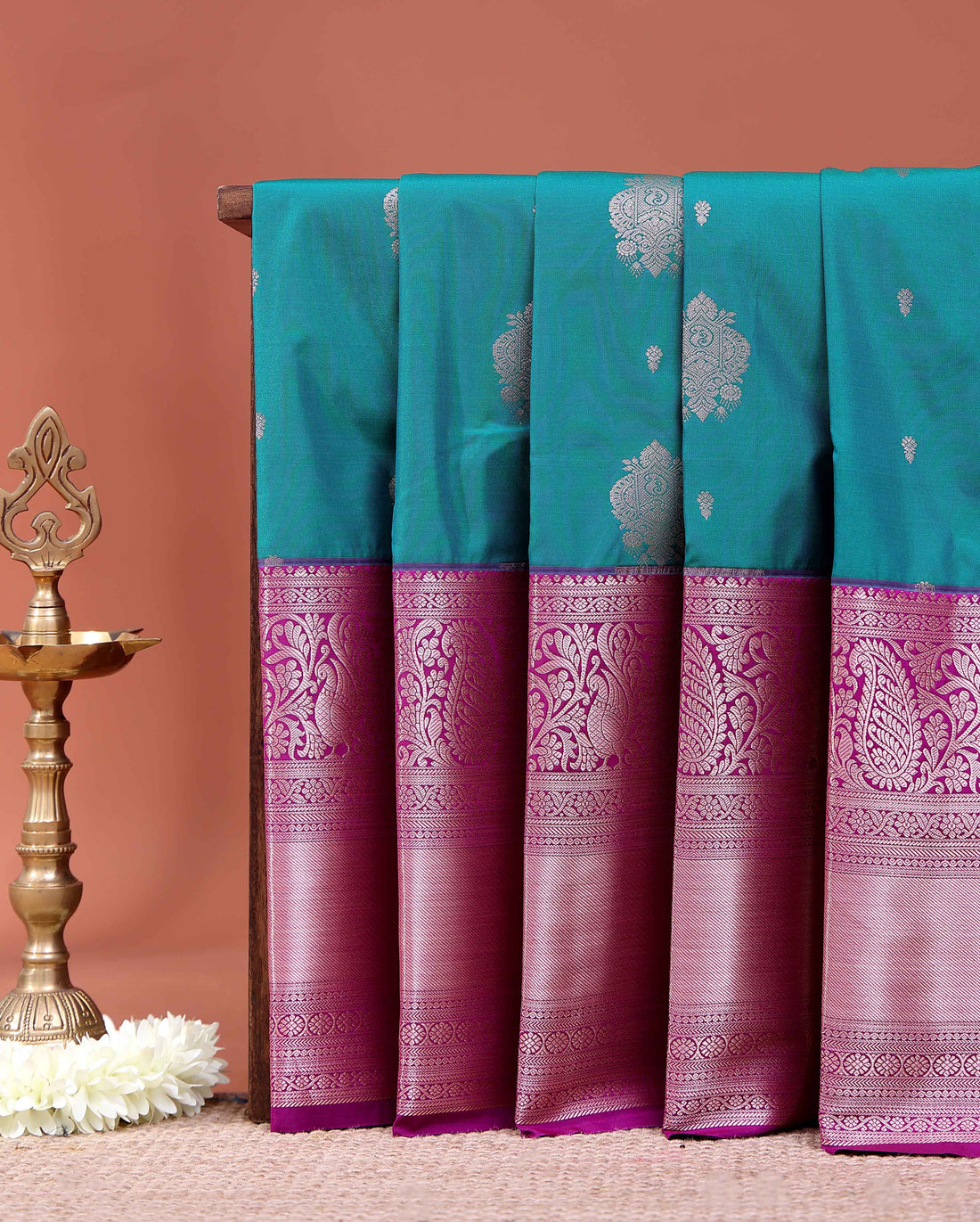 Elegant Niranjana Silk Saree with Intricate Floral Brocade Weaving and Rich Contrast Border - Teal