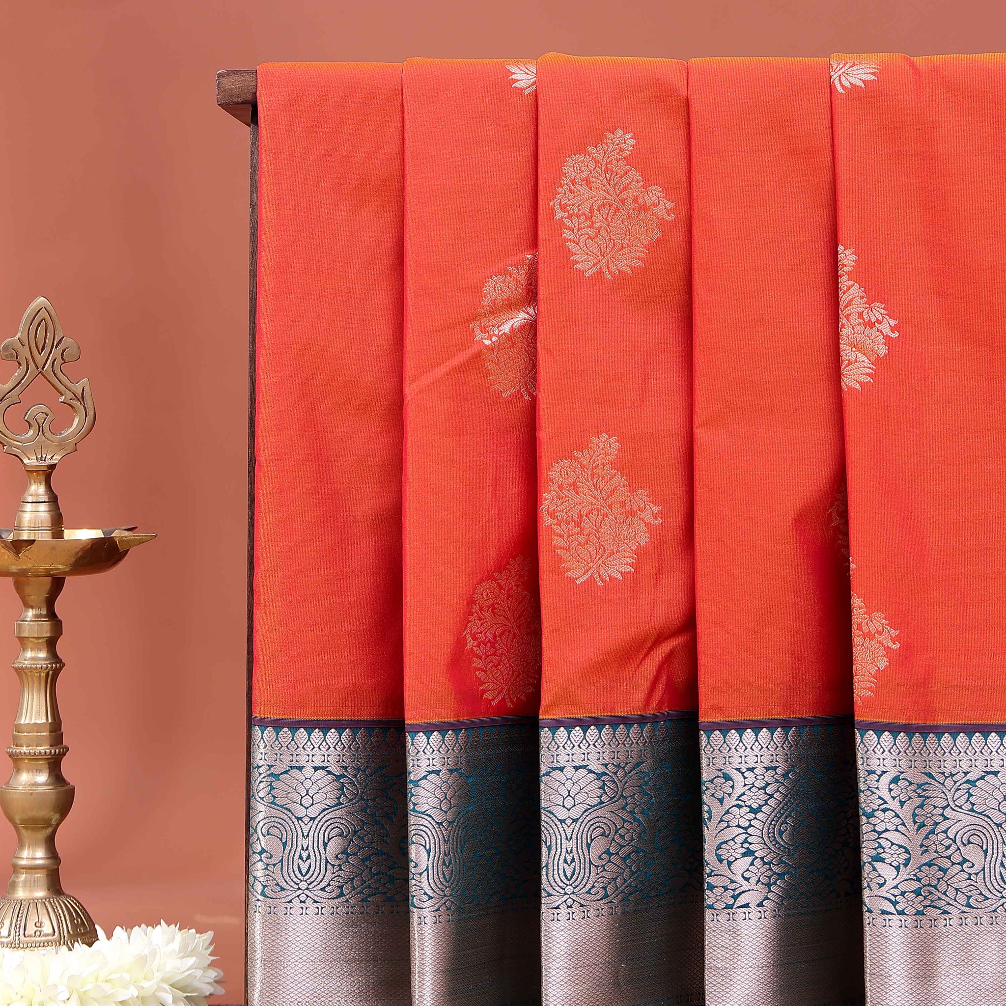 Elegant Niranjana Silk Saree with Intricate Floral Butta Weaving and Grand Traditional Zari Border - Orange