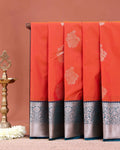 Elegant Niranjana Silk Saree with Intricate Floral Butta Weaving and Grand Traditional Zari Border - Orange