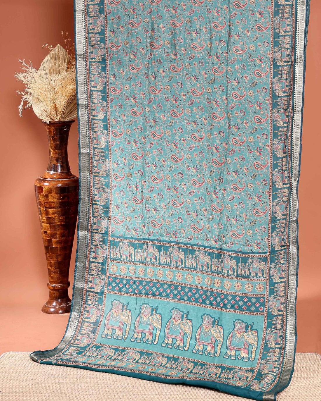 Elegant Semi Chanderi Saree Featuring Floral Butta Pattern and Elephant Motif Pallu - Green