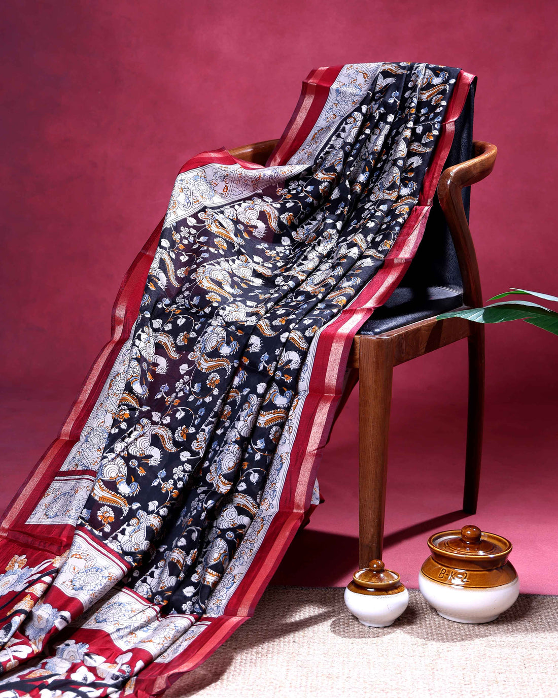 Elegant Semi Chanderi Saree with Kalamkari Inspired Motifs and A Plain Gold Woven Border - Black