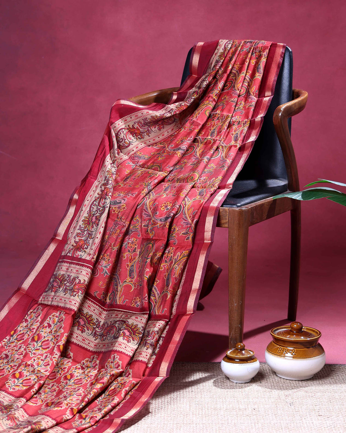 Elegant Semi Chanderi Saree with Paisley Inspired Motifs and A Plain Gold Woven Border - Red