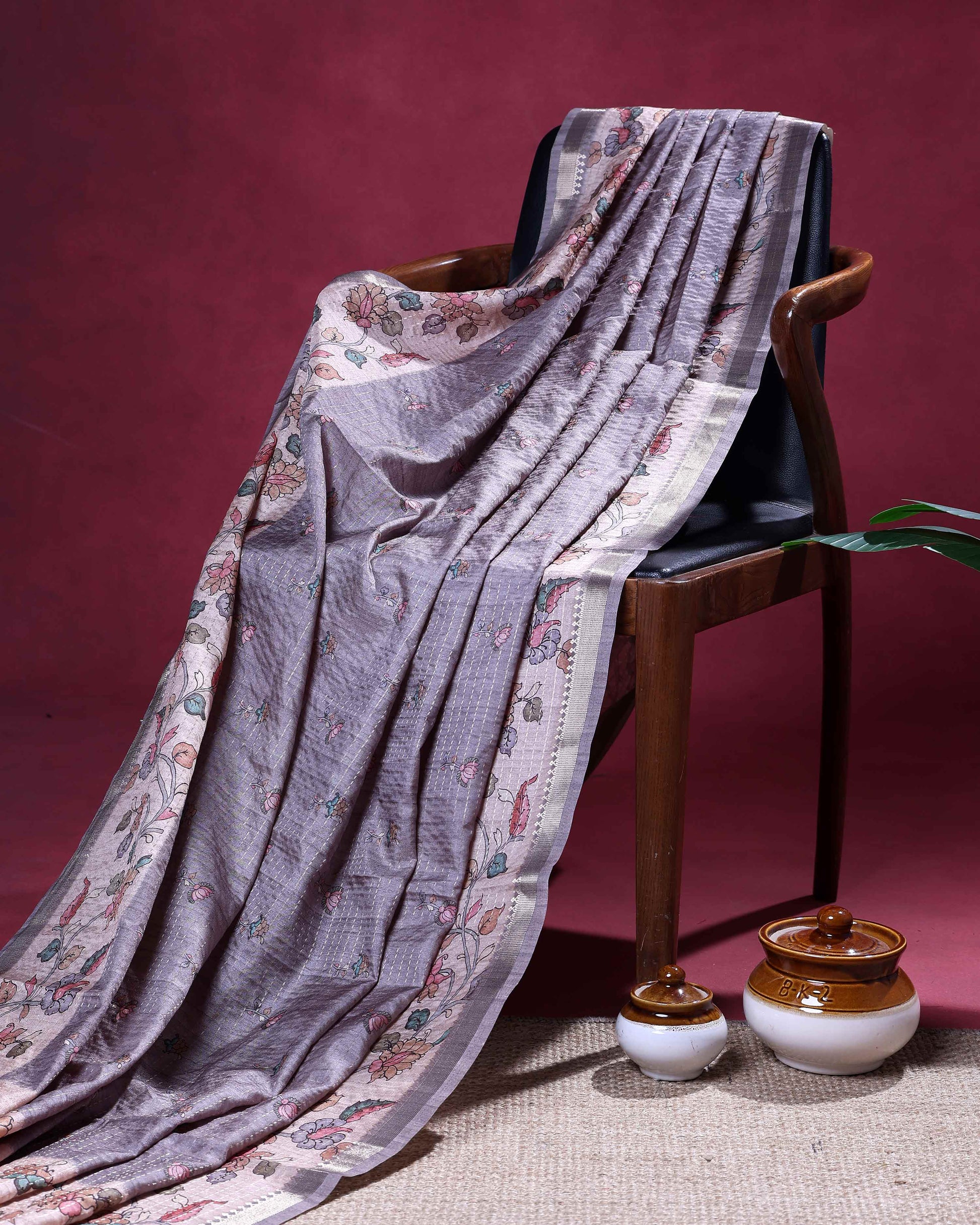 Elegant Semi Tussar Saree with Floral Motifs Textured Weave Body and Subtle Contrast Border - Pastel Purple