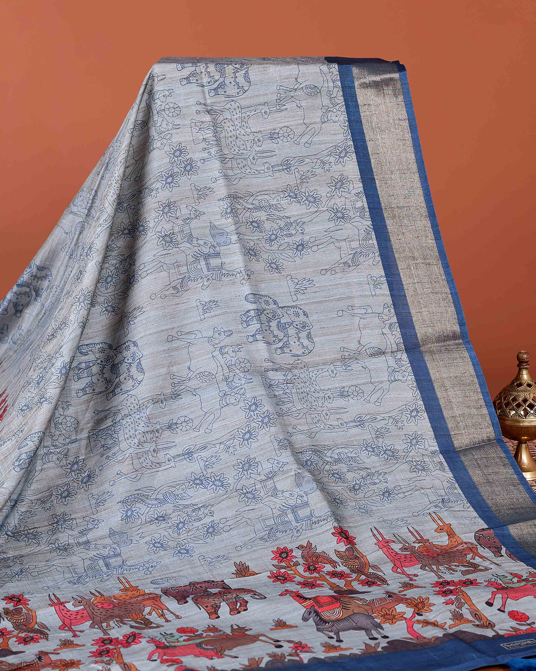 Elegant Semi Tussar Saree with Jaal Inspired Motifs and Zari Woven Border - Blue